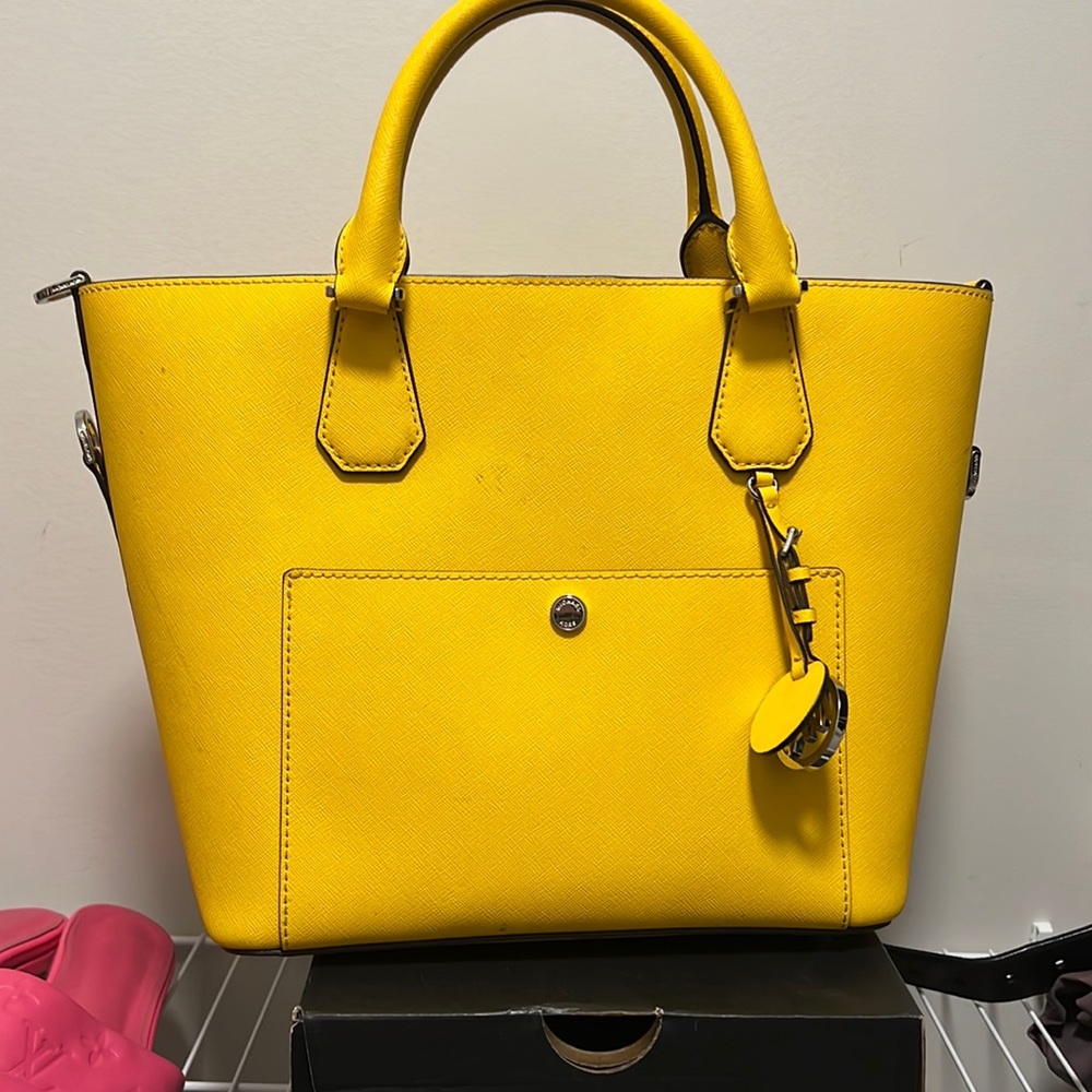 Yellow Michael Kors hand bag.